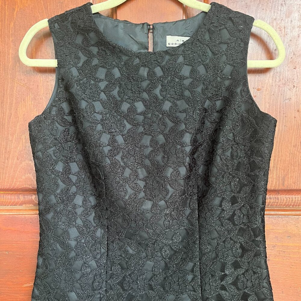 Black lace sleeveless top.